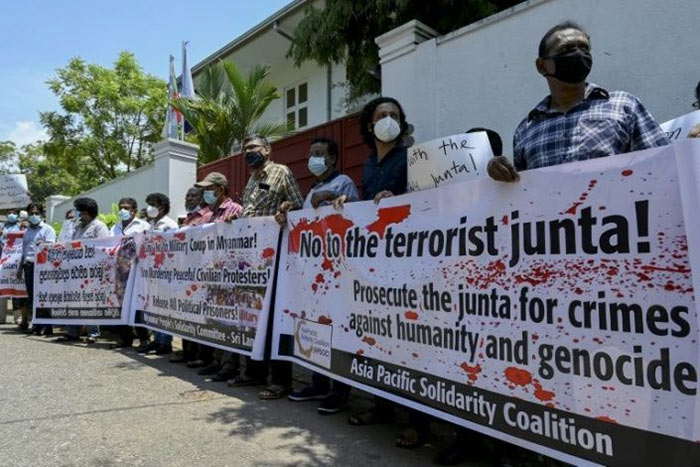 Activists protest outside Myanmar's embassy in Colombo Sri Lanka