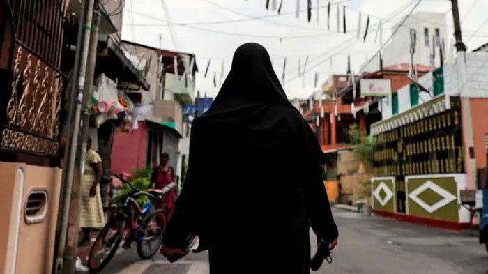 A Muslim woman wearing a hijab