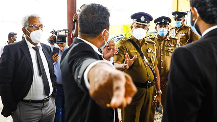 Nalin Bandara with policemen