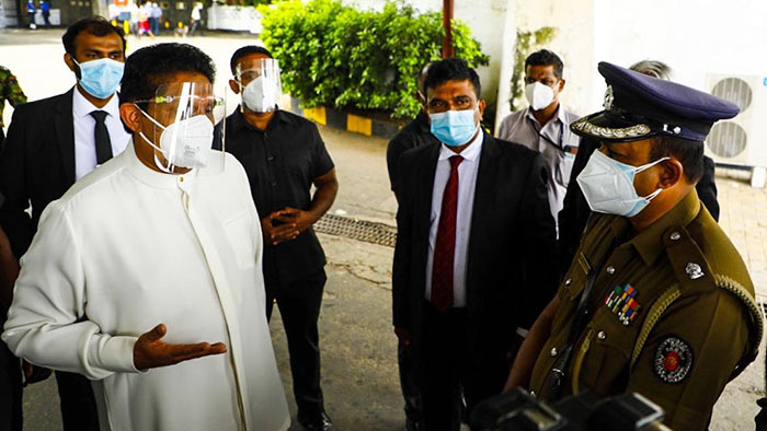 Sajith Premadasa with policeman