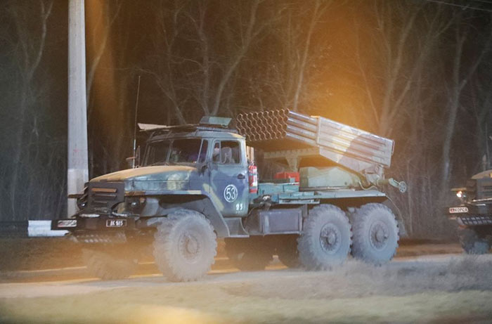 A military vehicle is seen on a street on the outskirts of the separatist-controlled city of Donetsk, Ukraine