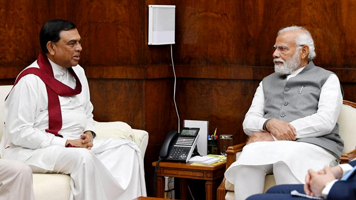 Sri Lanka's Finance Minister Basil Rajapaksa meets Indian Prime Minister Narendra Modi