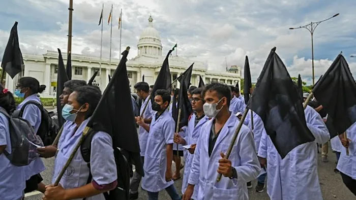Medical students take part in an anti-government protest in Colombo, Sri Lanka