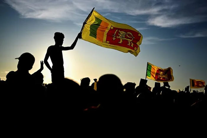 Protestors shout slogans against Sri Lanka President Gotabaya Rajapaksa near the Presidential Secretariat