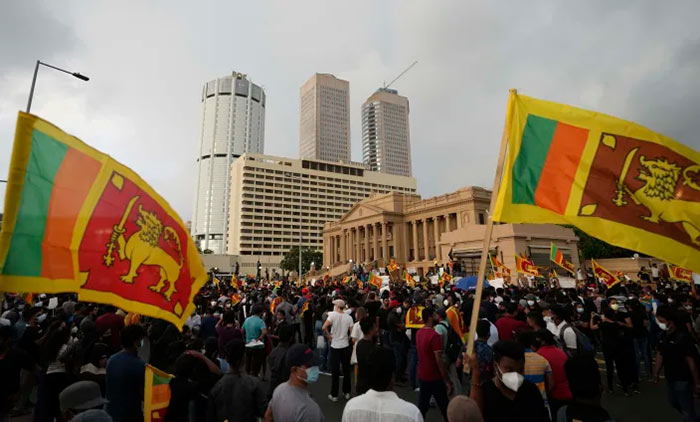 Sri Lankans protest outside the President's office in Colombo Sri Lanka