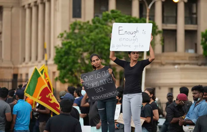 Sri Lankans protest outside the President's office in Colombo Sri Lanka