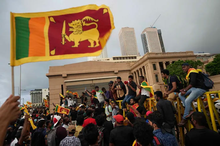 Sri Lankans protest outside the President's office in Colombo Sri Lanka