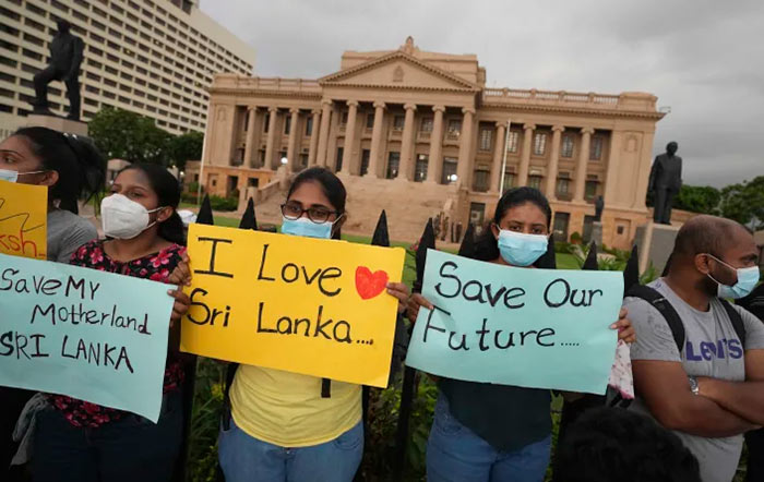 Sri Lankans protest outside the President's office in Colombo Sri Lanka