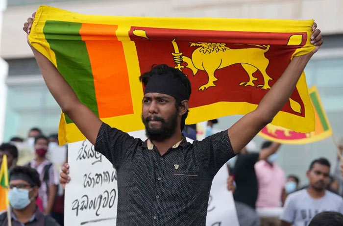 Sri Lankans protest outside the President's office in Colombo Sri Lanka