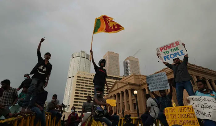 Sri Lankans protest outside the President's office in Colombo Sri Lanka