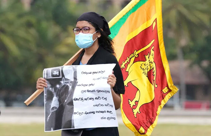 Sri Lankans protest outside the President's office in Colombo Sri Lanka