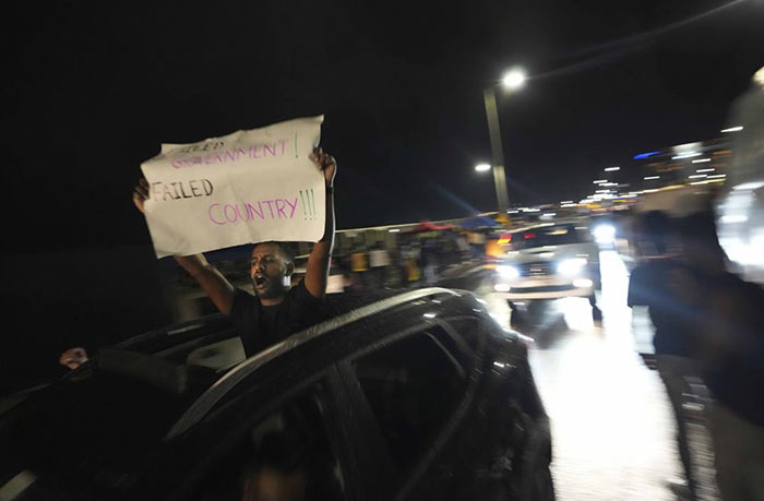 Sri Lankans shout anti Government slogans in Colombo Sri Lanka