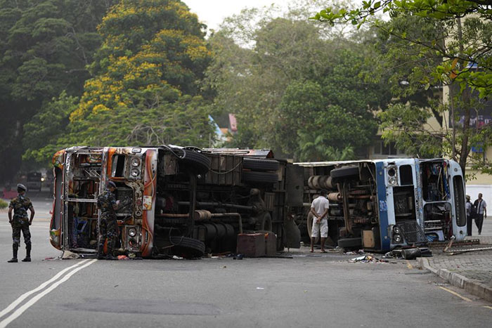 Burnt buses after clashes in Colombo, Sri Lanka