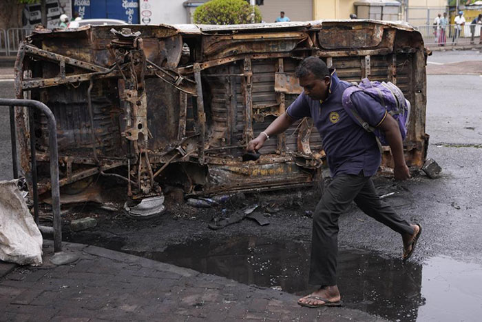 Burnt vehicles a day after clashes between Government supporters and anti-government protesters in Sri Lanka