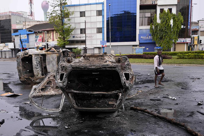 Burnt vehicles a day after clashes between Government supporters and anti-government protesters in Sri Lanka