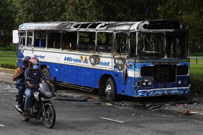 Burnt vehicles a day after clashes between Government supporters and anti-government protesters in Sri Lanka