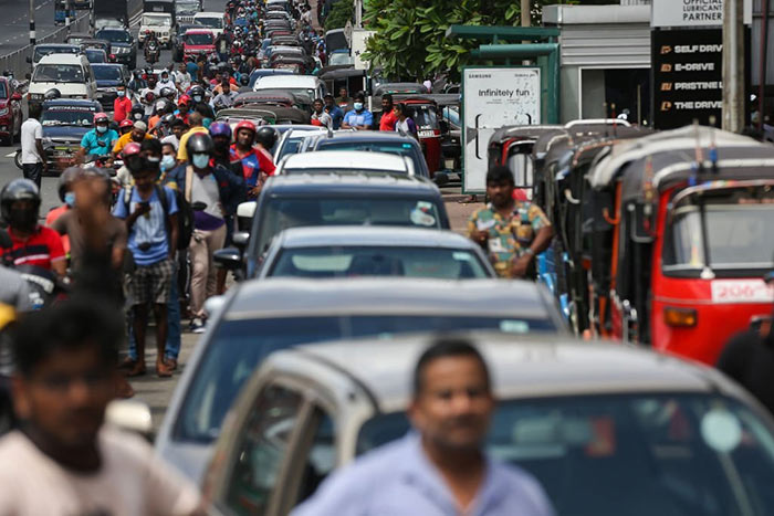 Drivers are waiting to buy petrol at a petrol station in Colombo, Sri Lanka