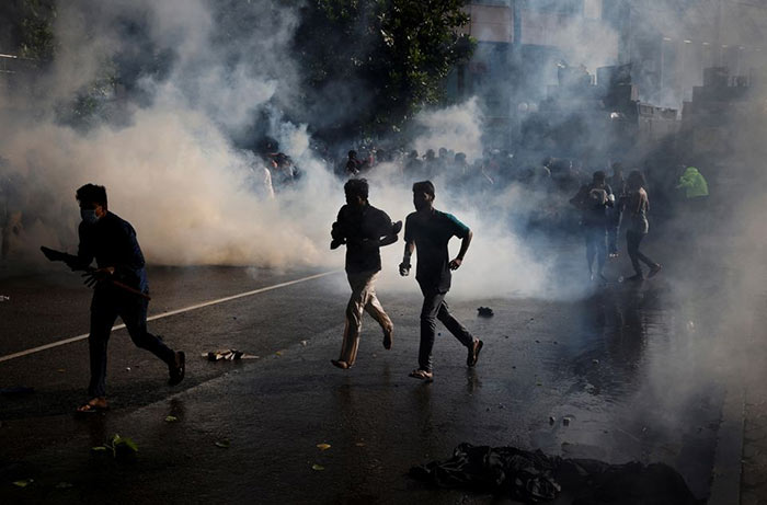 Police use tear gas to disperse protestors in Colombo, Sri Lanka