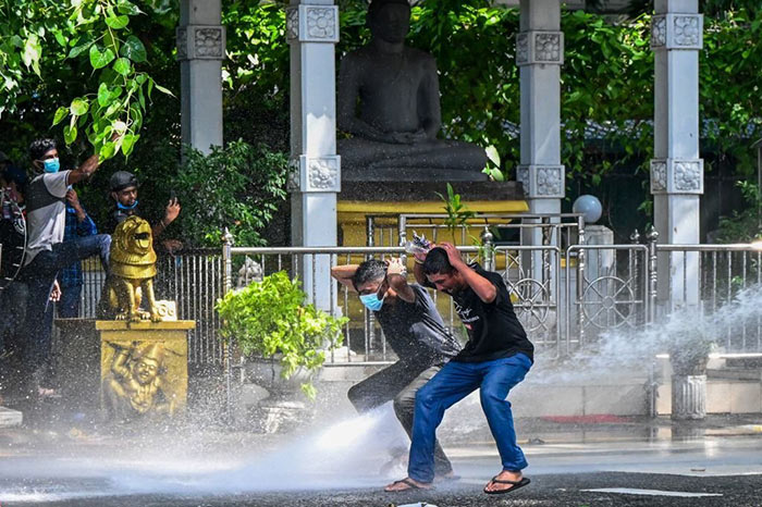 Sri Lanka Police use water cannons to disperse Higher National Diploma (HND) students protest in Colombo, Sri Lanka