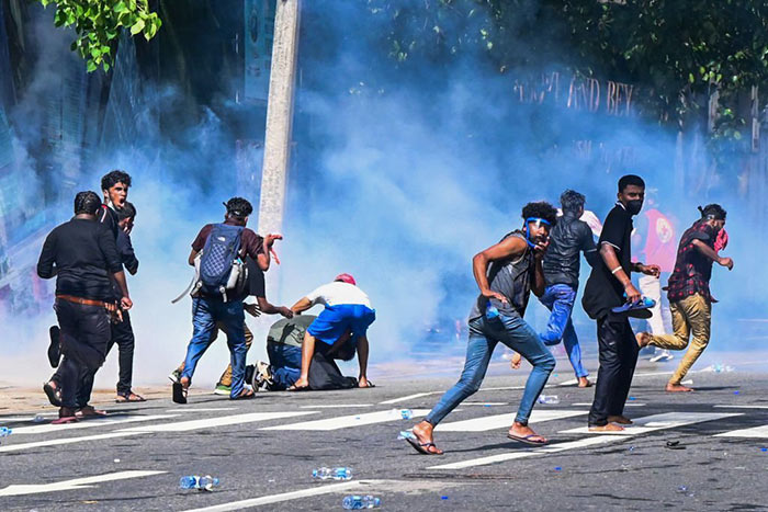 Sri Lanka Police use tear gas to disperse Higher National Diploma (HND) students protest in Colombo, Sri Lanka