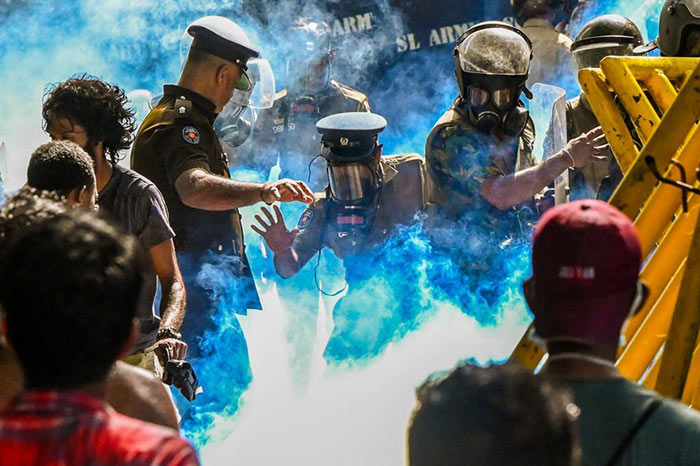 Sri Lanka Police use tear gas to disperse Higher National Diploma (HND) students protest in Colombo, Sri Lanka