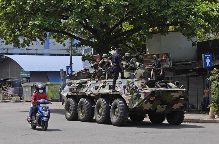 Sri Lankan Army soldiers patrol during curfew in Colombo, Sri Lanka