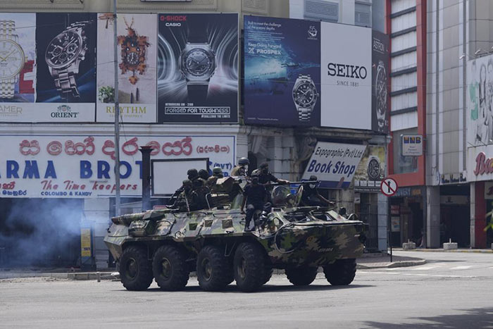 Sri Lankan Army soldiers patrol during curfew in Colombo, Sri Lanka