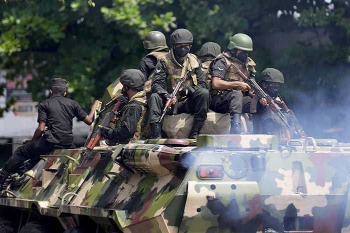 Sri Lankan Army soldiers patrol during curfew in Colombo, Sri Lanka