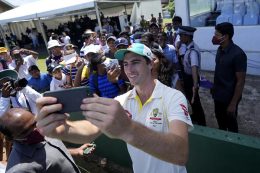 Australia's Cricket captain Pat Cummins takes selfie photos with Sri Lankan fans