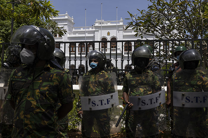 Police Special Task Force - STF - stand guard during a protest outside the Prime Minister's office in Colombo Sri Lanka