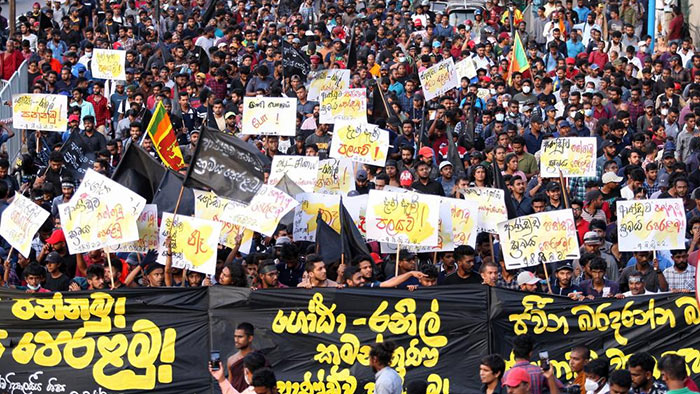 Sri Lanka's university students shout slogans during a protest march in Colombo, Sri Lanka