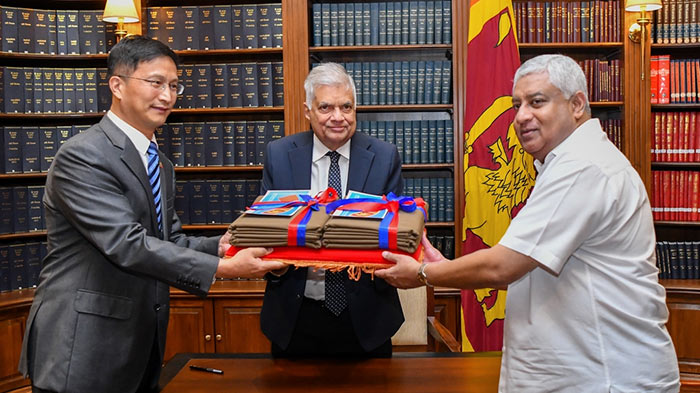 Chinese Embassy donates uniform material for Sri Lanka Police