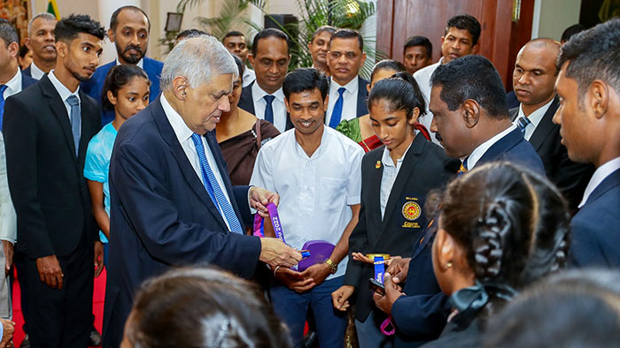 Sri Lanka President Ranil Wickremesinghe meets athlete Tharushi Karunarathna
