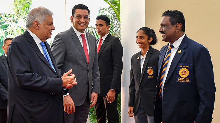 Sri Lanka President Ranil Wickremesinghe meets athlete Tharushi Karunarathna