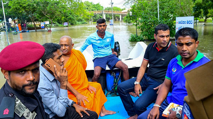 State Minister of Defence Premitha Bandara Tennakoon inspects welfare of monks at flood affected Somawathiya