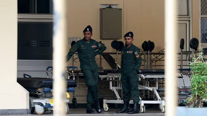 Sri Lanka Army soldiers stand at the National Hospital in Colombo