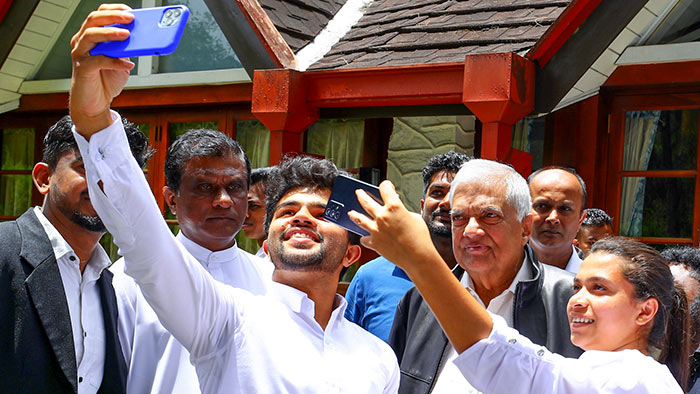 Sri Lankan President Ranil Wickremesinghe engaging with young people