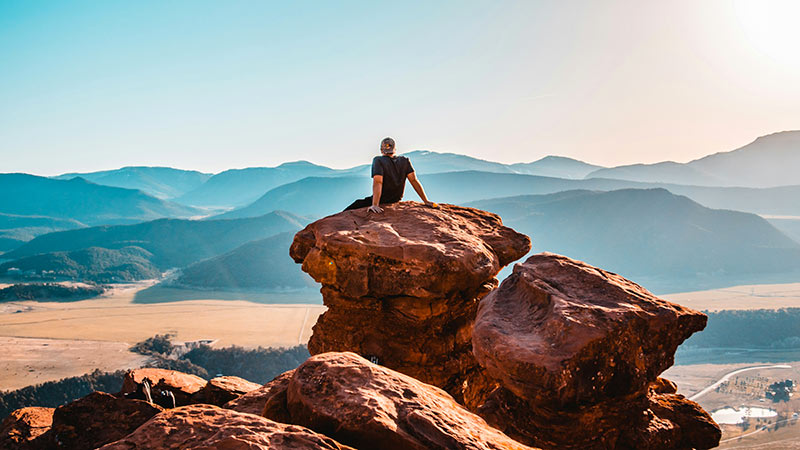 Man sitting on a rock