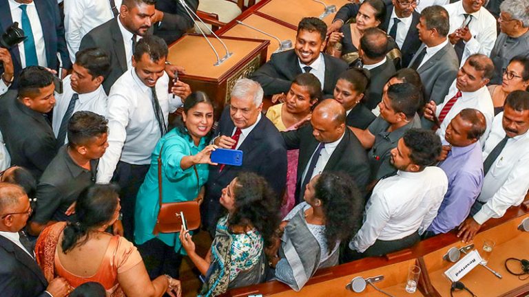 Sri Lankan President Ranil Wickremesinghe with people