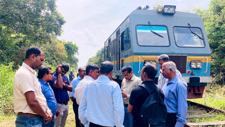 Sri Lankan Government officials conducting a field inspection along the railway tracks to assess elephant safety measures