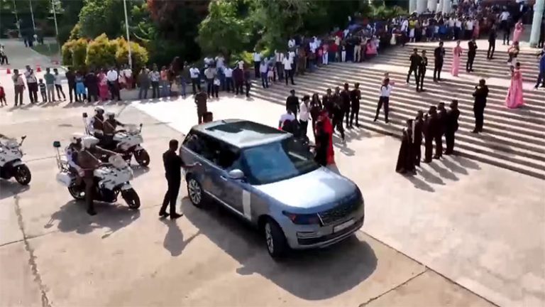 Tuition teacher motorcade with police escort during public event in Sri Lanka