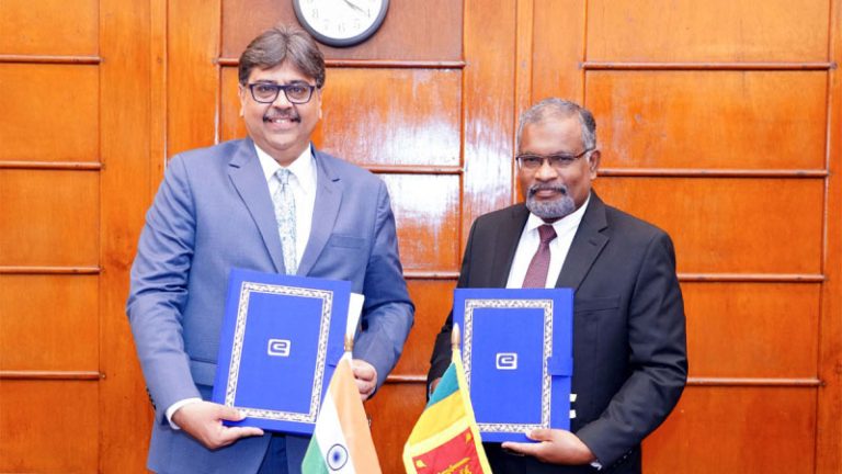 Nirmit Ved and K.M. Mahinda Siriwardana at the signing ceremony between Sri Lanka and EXIM Bank of India