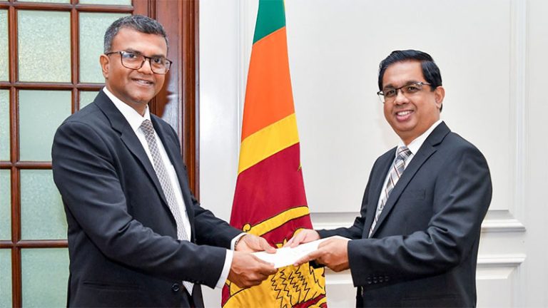 Dr. Harshana Suriyapperuma receives his official letter of appointment from Secretary to the President, Dr. Nandika Sanath Kumanayake