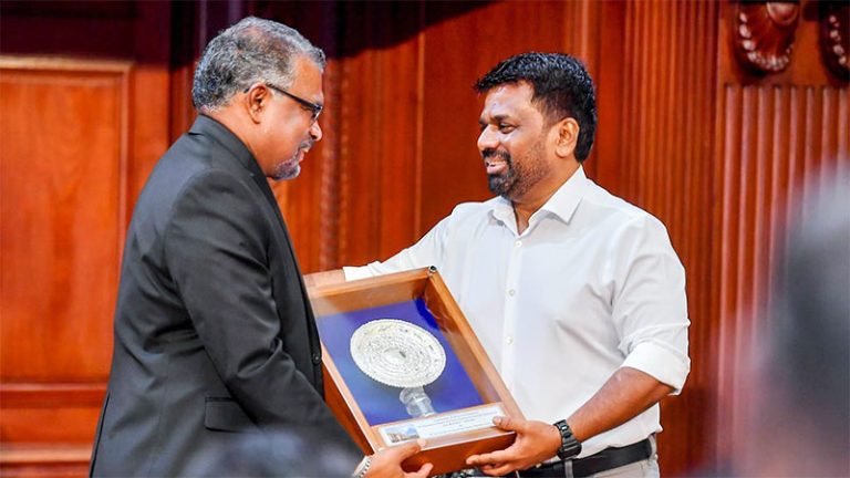 Outgoing Treasury Secretary Mahinda Siriwardana with Sri Lanka President Anura Kumara Dissanayake