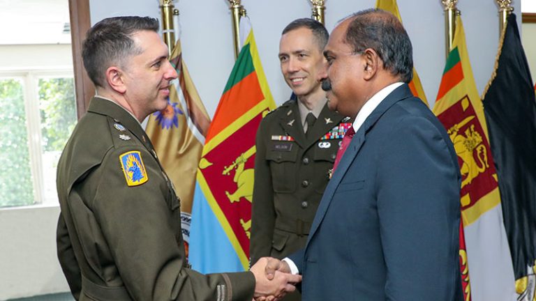 US Defence Attaché Lt. Col. Matthew House shakes hands with Sri Lanka’s Deputy Defence Minister Maj. Gen. Aruna Jayasekara (Retd)