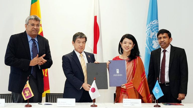 Minister of Justice Harshana Nanayakkara observes as Ambassador Akio Isomata and UNDP Representative Azusa Kubota sign the anti-corruption grant agreement at the Embassy of Japan in Sri Lanka