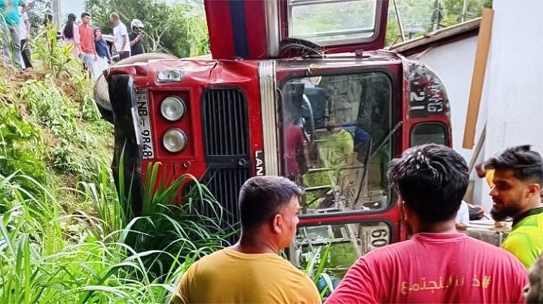 SLTB bus overturns in Wattegama, Sri Lanka