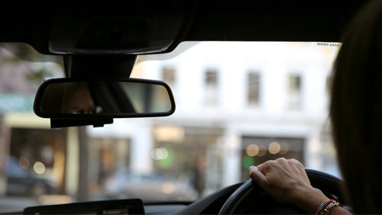 A person driving a car