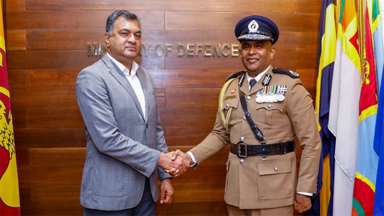 Newly appointed IGP Priyantha Weerasooriya shaking hands with Defence Secretary Air Vice Marshal Sampath Thuyacontha during a courtesy meeting on August 25, 2025