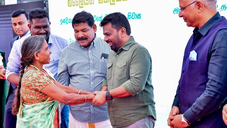 President Anura Kumara Dissanayake handing over housing ownership deeds to the Malayagam community